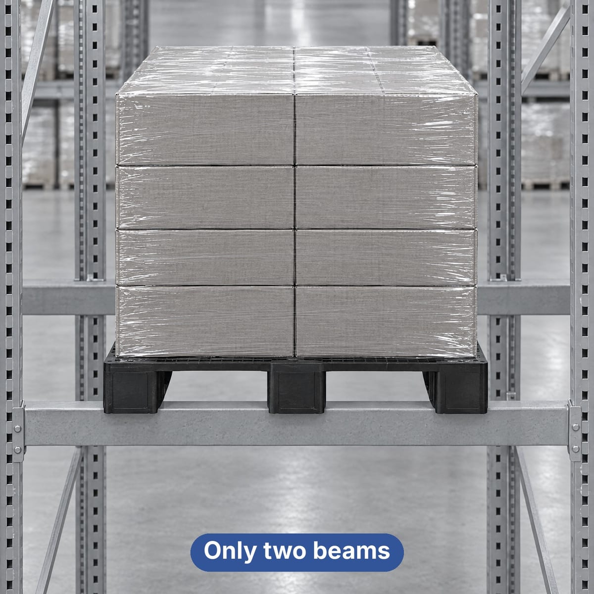Plastic pallet with runners loaded with cartons, suspended between the two beams of pallet racking